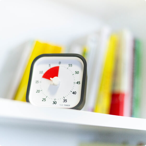 A timer on a shelf